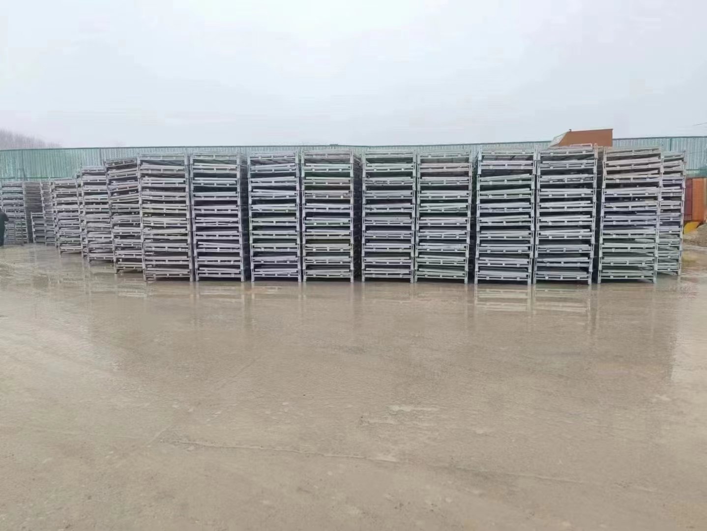 Wire mesh cages in batch compact storage — warehouse view